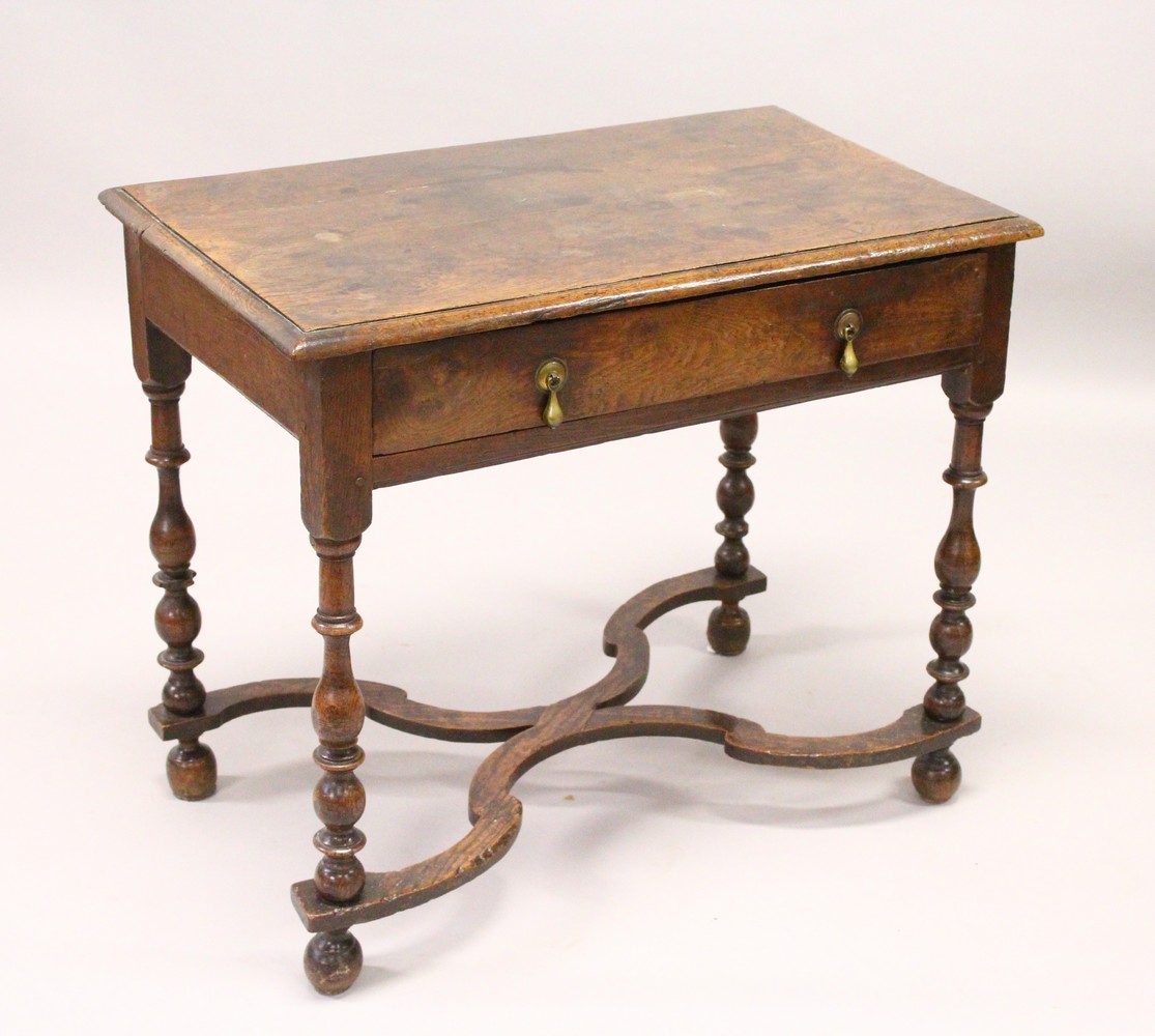 AN 18TH CENTURY OAK SIDE TABLE, with one long drawer, on turned legs united by an "X" shape