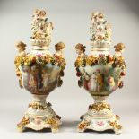 A PAIR OF MEISSEN STYLE VASES, handles modelled as female busts. 73cms high.