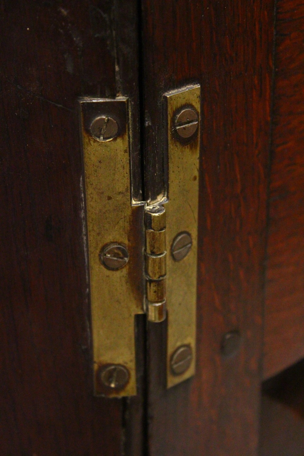 A 19TH CENTURY OAK HANGING CORNER CUPBOARD, with a pair of panelled doors enclosing three shelves. - Image 3 of 8