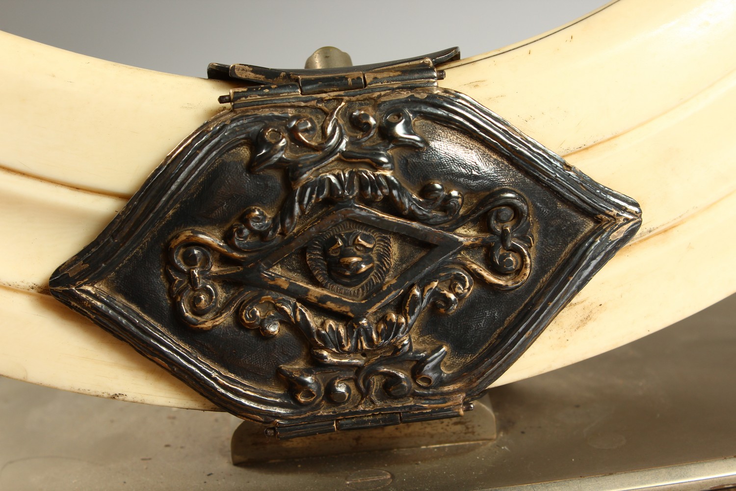 A LATE 19TH CENTURY BOARS TUSK PHOTOGRAPH FRAME, the pair of tusks joined by an ornate clasp, - Image 3 of 10