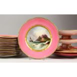 A SUPERB COPELAND DESSERT SERVICE with pink border and painted with shipping and coastal scenes,