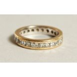 AN 18CT GOLD AND DIAMOND FULL ETERNITY RING.