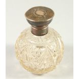 A SILVER TOP CUT GLASS SCENT BOTTLE. London 1909.