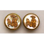 À PAIR OF CHINESE MOTHER-OF-PEARL AND GILT METAL STUDS.