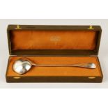 A CHRISTOFLE LADLE, boxed. 32cms long.