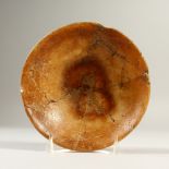 AN EGYPTIAN ALABASTER CIRCULAR BOWL. 18cms diameter.