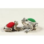 TWO SMALL SILVER FROG PIN CUSHIONS.
