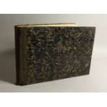 A MID 20TH CENTURY SCRAP ALBUM, oblong folio, in marbled boards.