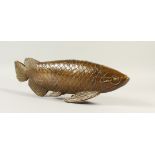 A BRONZE MODEL OF A CARP. 43cms long.