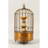 A BIRD CAGE AUTOMATON CLOCK. 19cms high.