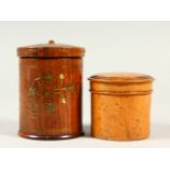TWO TREEN CIRCULAR POTS AND COVERS.