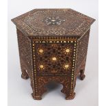 A BISCUIT TIN IN THE FORM OF AN OTTOMAN SIDE TABLE, Huntley and Palmers, England, early 20th