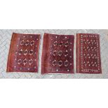 THREE TEKKE WALL HANGINGS. 114cm x 68cm, 110cm x 88cm and 115cm x 89cm.