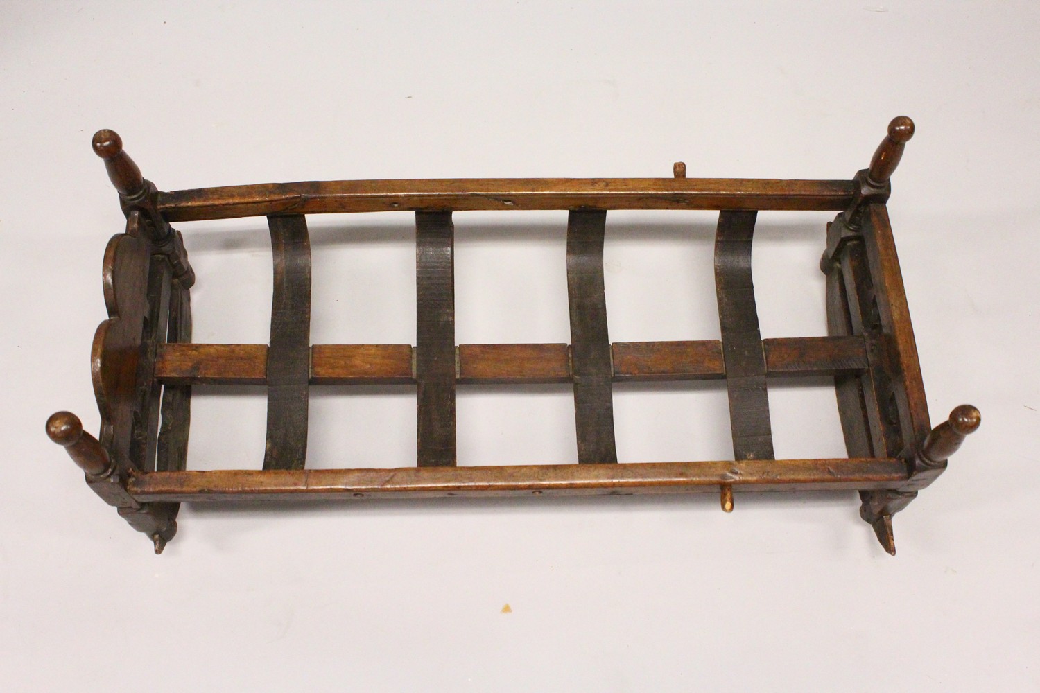 A 19TH CENTURY BEECH CRADLE, with pierced ends, turned corner columns and a slatted base on rockers. - Image 2 of 7