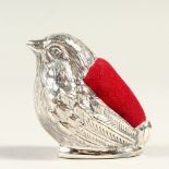 A SILVER BIRD PIN CUSHION.