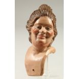 A SMALL NEOPOLITAN PAINTED TERRACOTTA BUST OF A WOMAN. 9cms high.