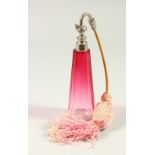 A RUBY GLASS TAPERING SCENT SPRAY BOTTLE.