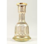 A GOOD BOHEMIAN GILT DECORATED BELL SHAPED DECANTER. 27cm high.