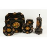 A RARE 19TH CENTURY TOLEWARE SET, comprising tea urn, shaped base, pair of waiters and two trays.
