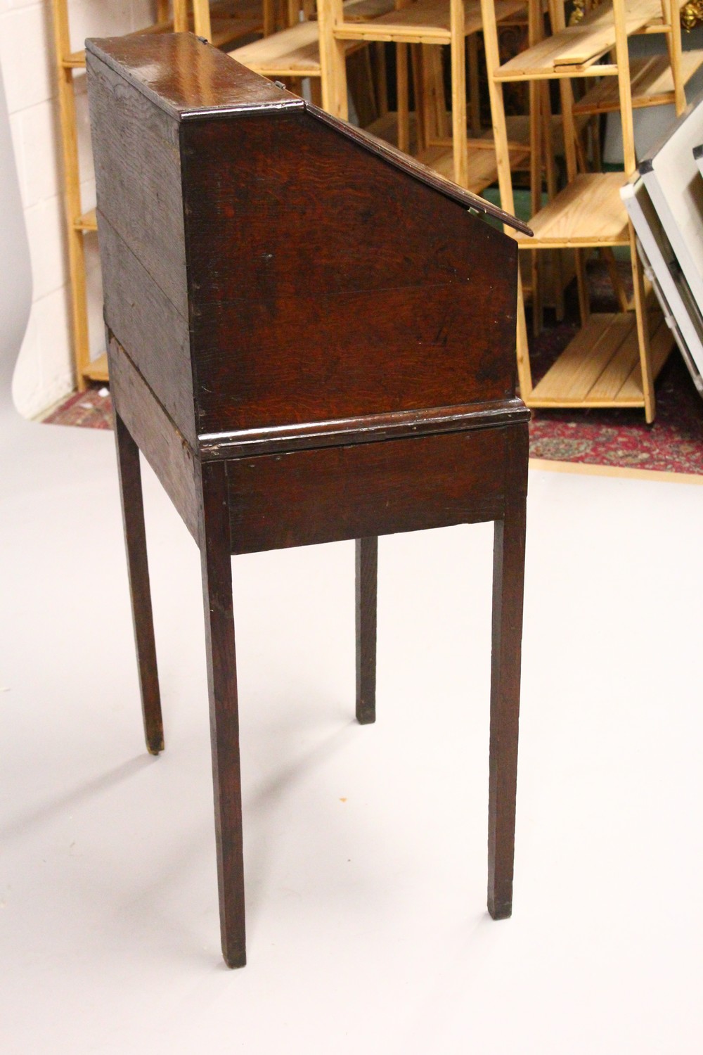 AN 19TH CENTURY OAK DESK ON STAND, with sloping front, fitted interior with small drawers, on a - Image 8 of 19