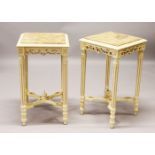 A PAIR OF FRENCH STYLE CREAM PAINTED SQUARE SHAPE TABLES, with inset marble tops. 42cm wide x 72cm