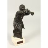 ANNE ROONEY (20TH CENTURY) AMERICAN "AL-MIZMOOR", a bronze of a man blowing a long horn. 32cm high.