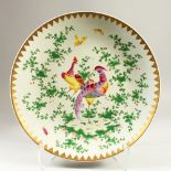 A SAMSON OF PARIS CHARGER, decorated with exotic birds within a gold dash border. 39cms diameter.