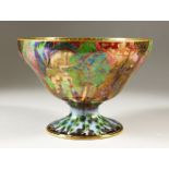 A WEDGWOOD FAIRY LUSTRE PEDESTAL CIRCULAR FRUIT BOWL, by Daisy Makeig-Jones, Number Z4968. 20cms