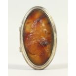 AN 18TH CENTURY FRENCH OVAL SNUFF BOX, the top with a portrait in tortoiseshell. 9cms long.