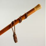 A HORN HANDLED MALACCA WALKING STICK. 91cm long.