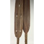 TWO LARGE NATIVE PADDLES.