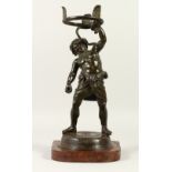 A GOOD 19TH CENTURY BRONZE OF THE GREEK GOD SILENUS, wrestling a serpent above his head, on a marble