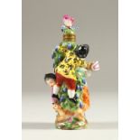 A MEISSEN DESIGN PORCELAIN SCENT BOTTLE AND STOPPER, moulded with three figures. 10cms high.