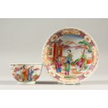 A 19TH CENTURY TEA BOWL AND SAUCER, decorated with Chinese figures.