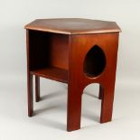 A MAHOGANY HEXAGONAL SHAPE BOOK TABLE, with pierced sides and open shelves. 52cm wide x 56cm high.