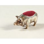 A SILVER NOVELTY HOG PIN CUSHION.