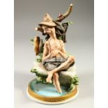 A GOOD CAPODIMONTE PORCELAIN GROUP, old man sleeping on a bench, fish hanging up. 24cm high.