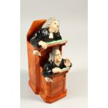A POTTERY FIGURE GROUP "THIS VICAR AND MOSES", signed R. WOOD 1794. 24cms high.