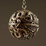 A SILVER PIERCED BALL CENSER. 6cms diameter.