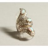 A SILVER, OPAL AND CZ RING.