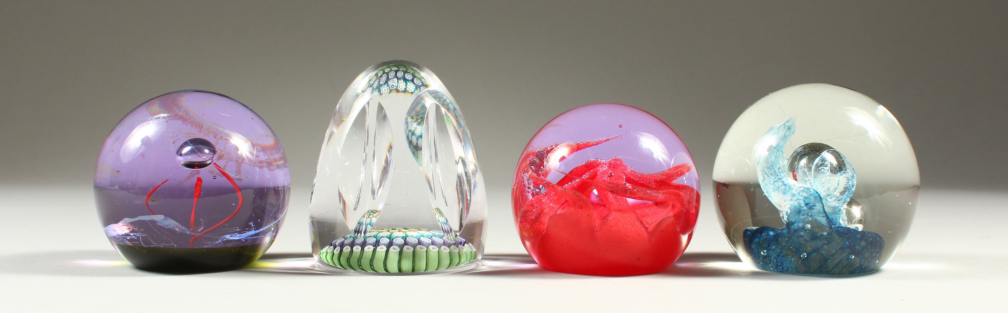 A MILLEFIORI PAPERWEIGHT AND THREE CAITHNESS WEIGHTS (4).