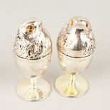 A PAIR OF CHICK EGG WARMERS. 12cms high.
