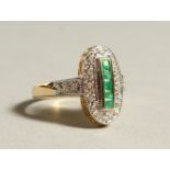 A 9CT GOLD CALIBRE CUT DIAMOND AND EMERALD RING.