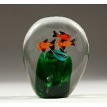A MURANO STYLE GLASS FISH DECORATED PAPERWEIGHT. 11cm high.