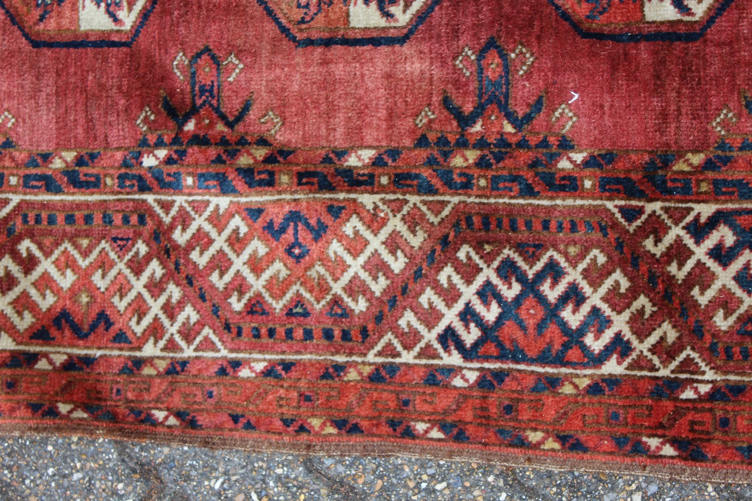 A LARGE TEKKE BOKHARA RUG, rust ground with four rows of eleven gulls, and broad end fringe. 135cm x - Image 3 of 10