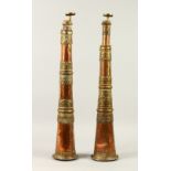 A PAIR OF UNUSUAL ISLAMIC COPPER AND BRASS TELESCOPIC HORNS/ BUGLES 160cms extended.