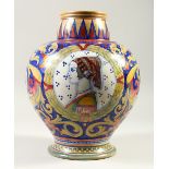 AN ITALIAN LUSTRE DECORATED BULBOUS VASE, with a portrait bust painted to each side. 31cm high.