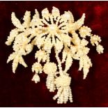 A VICTORIAN SEED PEARL BROOCH from WIDDOWSON & VEALE.