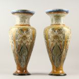 A LARGE PAIR OF DOULTON LAMBETH STONEWARE VASES by ELIZA SIMMANCE, Pattern No. 905, decorated with