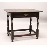 AN 18TH CENTURY OAK SIDE TABLE, with a single long drawer, on turned legs united by stretchers. 84cm